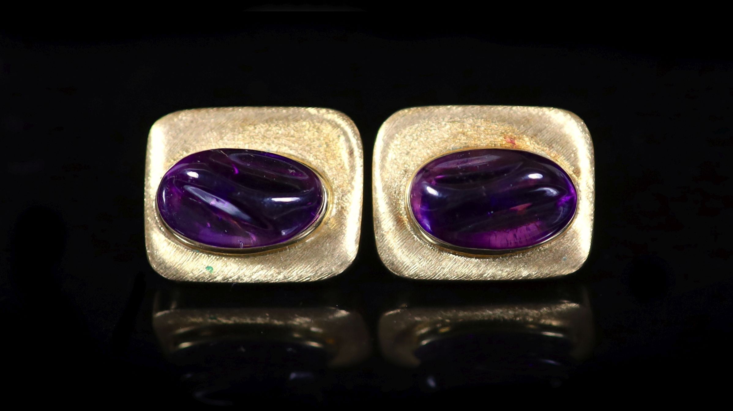 A pair of 1970's Brazilian textured 750 gold and cabochon amethyst Forma Livre set rectangular ear clips, by Haroldo Burle-Marx